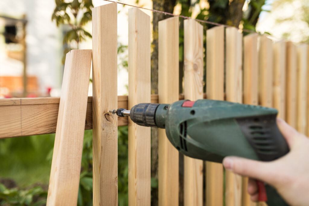 Building a new wooden natural fence - work tools